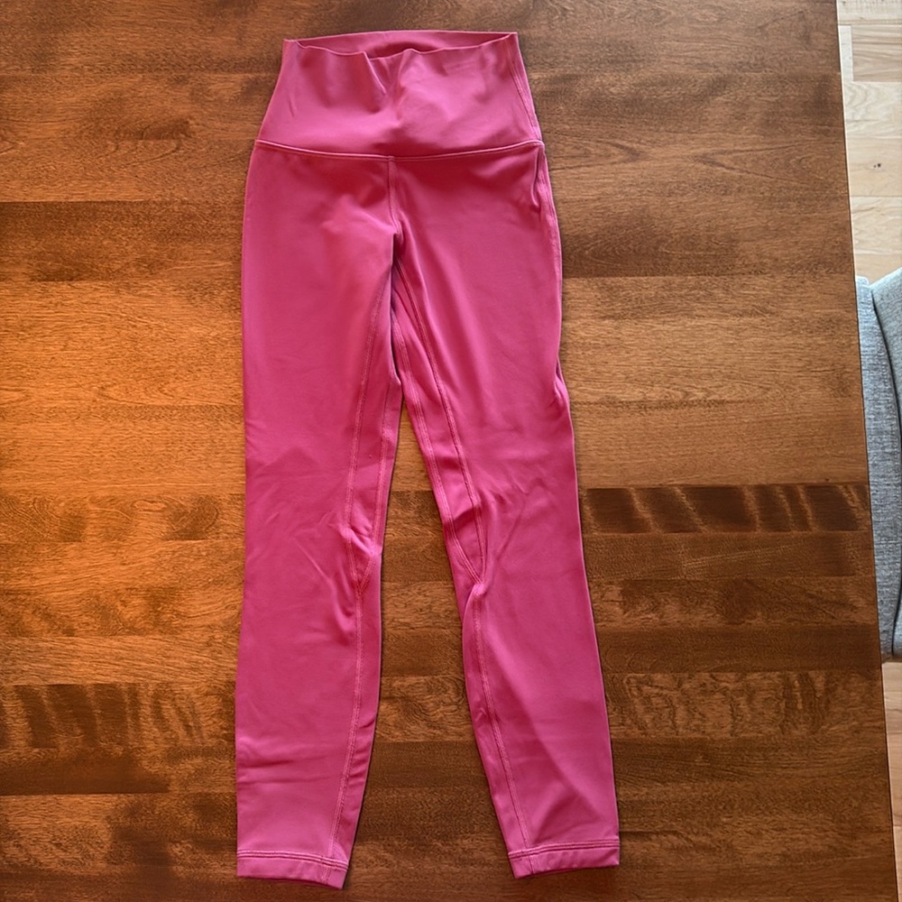 Lululemon Pink Lychee Align Leggings 25”. True color shows in first 2 photos.